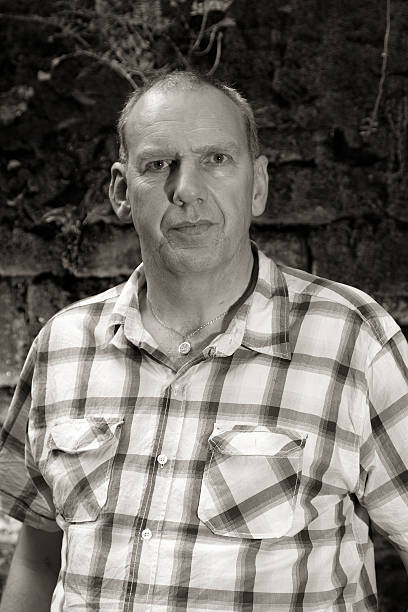 istock Mature man in check shirt portrait 183297945