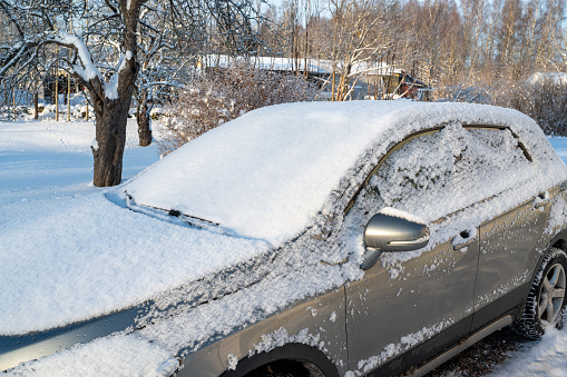 Snowy and frozen car in Kumla Sweden December 3 2023
