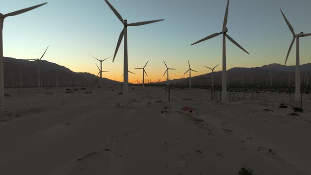November 2023 - 4K aerial of wind turbines in Palm Springs Desert, California, USA.