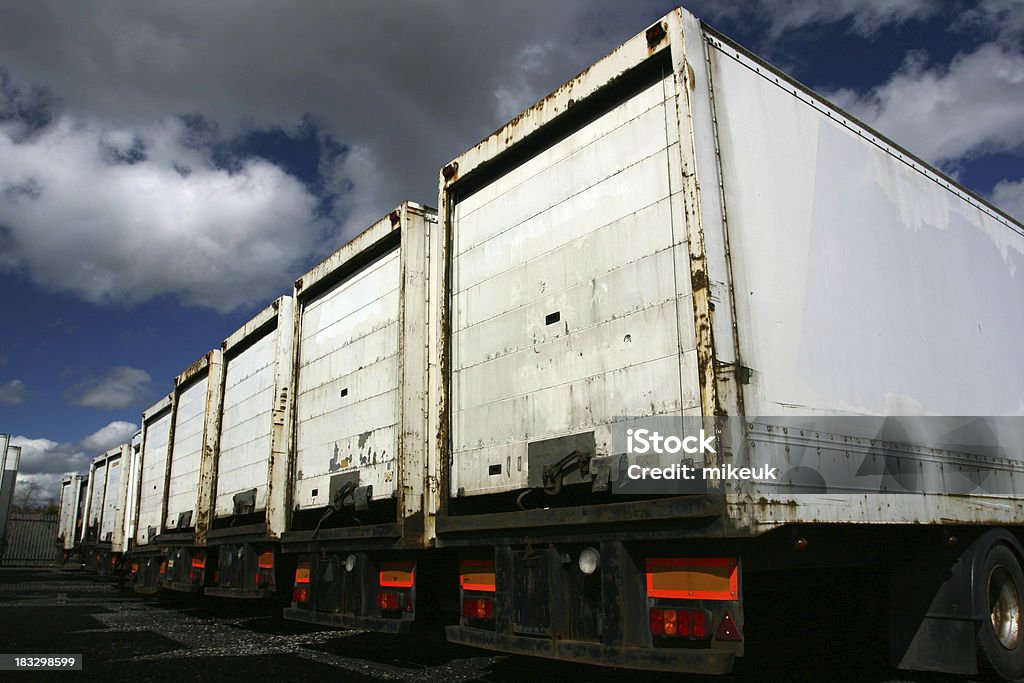 articulated truck trailers in park Cargo Container Stock Photo