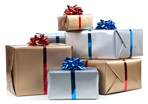 istock Silver and gold wrapped presents with blue and red ribbon  183298688