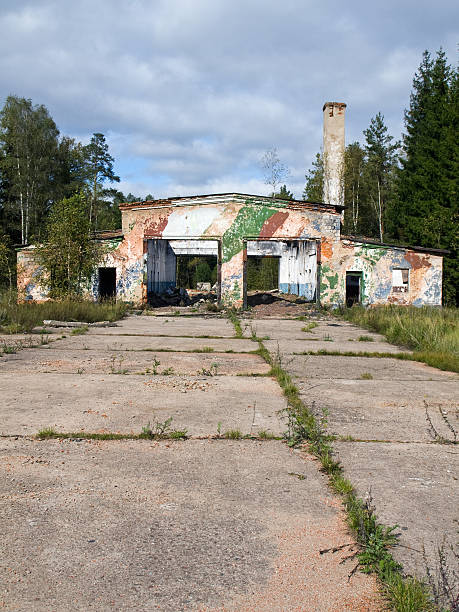istock Ruins of military base in a forest 183299296