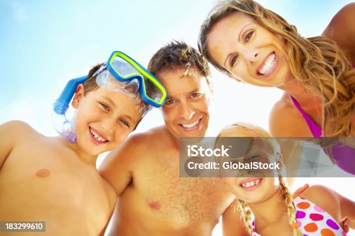 istock Happy family enjoying their vacation 183299610