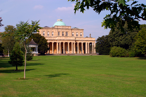 The famous Pump Rooms old spa mineral water buildings in Pittville Park, Cheltenham, Gloucestershire,UK