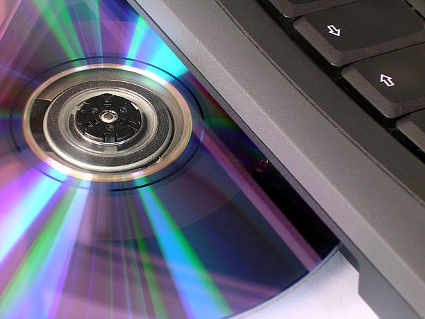 Notebook Laptop Pc With Disk Stock Photo - Download Image Now - Blue, Byte, CD-ROM - iStock Notebook Laptop Pc With Disk Stock Photo - Download Image Now - Blue, Byte, CD-ROM - iStock