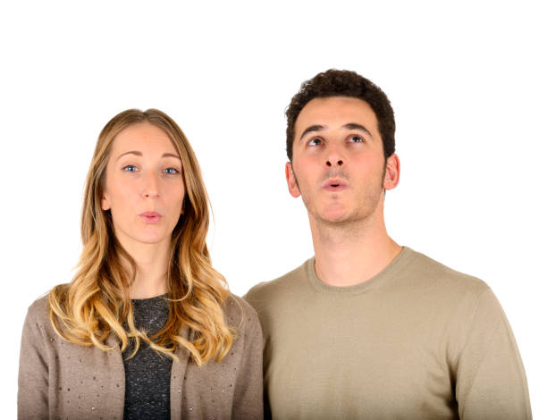 istock Young couple whistles on white bakground 1832999606