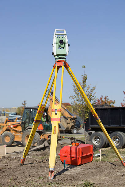 istock Total Station Surveying Instrument Against Construction Site Background 183300151