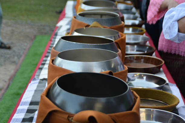 istock Give alms to monks, make merit in the morning 1833002573