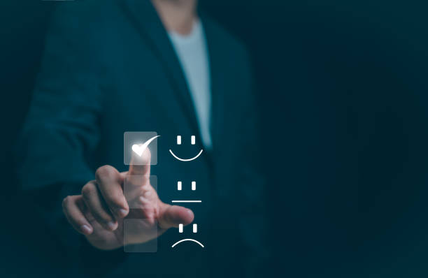 istock Customer service and Satisfaction concept, Businessman touching the virtual screen on the happy Smiley face icon to give satisfaction in service. rating very impressed. 1833007427