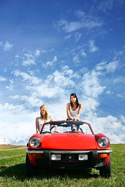 istock Woman in a convertible 183301203