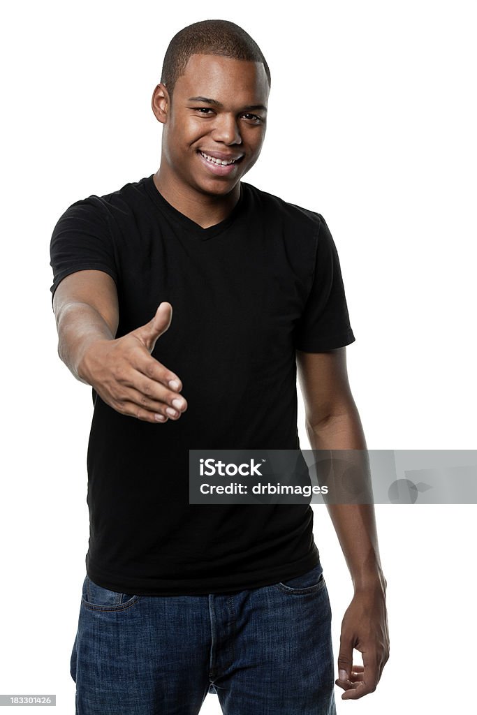 Young Man Offers to Shake Hand A young African American reaches out to shake hands with the camera. Isolated on a white background. 16-17 Years Stock Photo