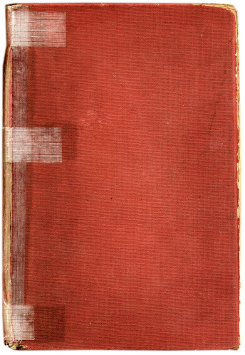 An old red book cover with tape on it