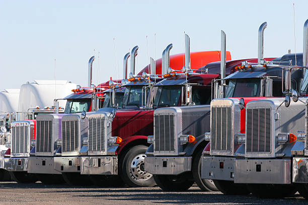 Modern Truck Line-up in Dealership  new big tube stock pictures, royalty-free photos & images