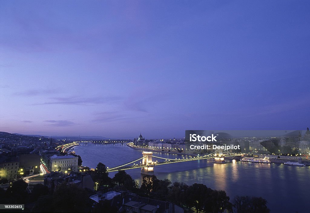 Budapest at Dusk Budapest at dusk showing Danube river. Bridge - Built Structure Stock Photo