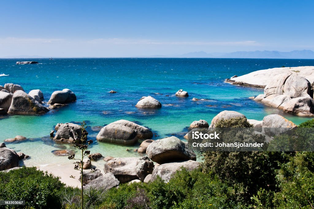 Boulders Beach in Simon's Town Boulders Beach in Simon's Town on the Cape Peninsula in South Africa. Home to one of few colonies of the vulnerable African Penguin (also known as Jackass Penguin). Situated just 30 km south of Cape Town. Beach Stock Photo