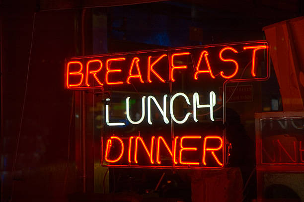 Neon Sign &#8211; Breakfast, Lunch, Dinner stock photo