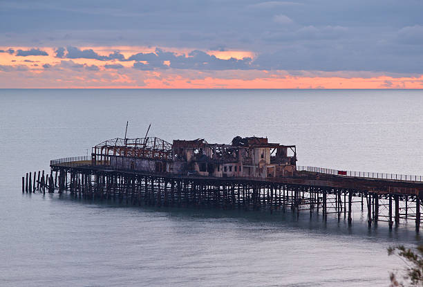 Blue and purple dusk light with calm sea at Brighton's West Pier