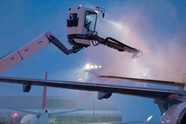 istock Deicing of airplane at airport 1833043364