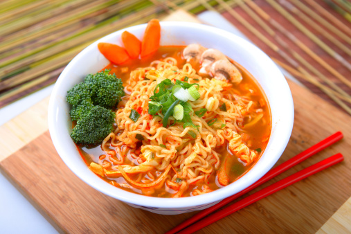 Khao Soi Thai Curry soup isolated in black background