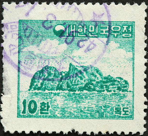 istock rocky Korean island on an old postage stamp 183304781