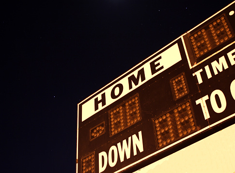 football scoreboard at night