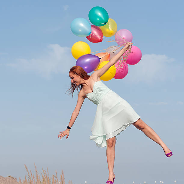 istock Woman with ballons 183305187
