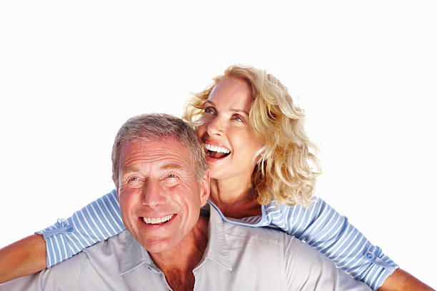 istock Cheerful mature couple against white background 183305207