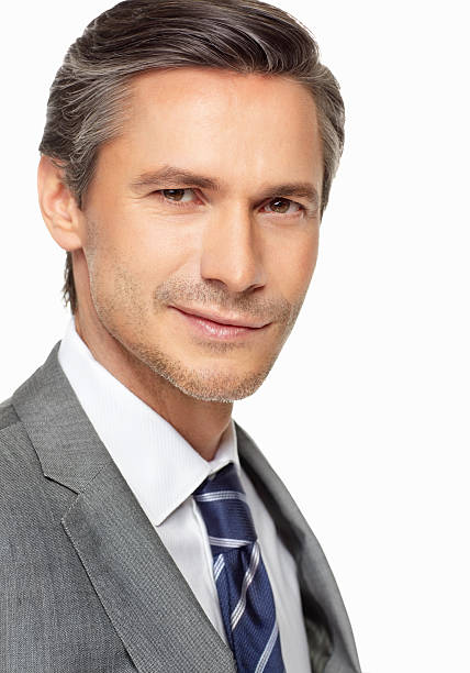 istock Handsome businessman looking confidently against white background 183305221