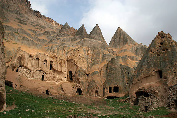 Cappadokia "Homes from Hittie times craved out of a mountain in Cappadokia, Turkey" nevsehir stock pictures, royalty-free photos & images