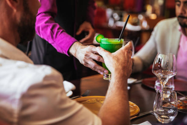 Friends having fun drinking mocktails in Dubai and celebrating a Birthday.