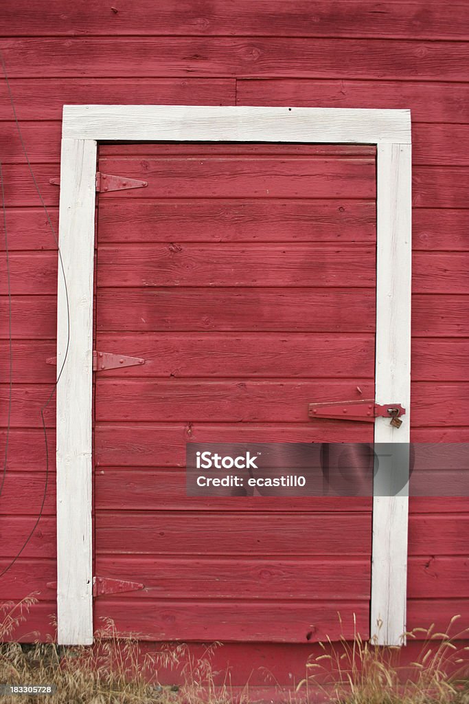 Red Barn Door Entrance to old barn. Barn Stock Photo