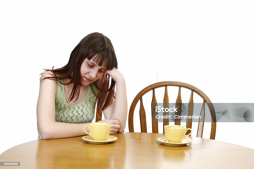 Date series - A long wait An upset girl waiting for her boyfriend at the cafe table. He is late. Adult Stock Photo