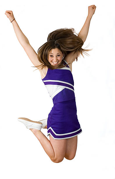 Football Cheerleader Jumping, Isolated On White High school cheerleader jumping in the air with a smile.  Isolated on white.Here's a lightbox of all of my football and cheerleader related shots: cheerleader photos stock pictures, royalty-free photos & images