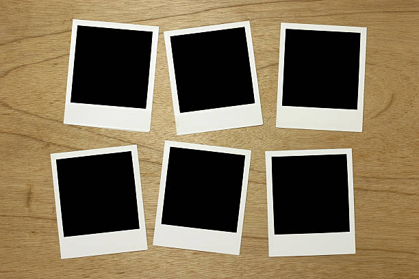Blank photo frames Six blank photo frames on wood surface.Similar images - number 6 photos stock pictures, royalty-free photos & images