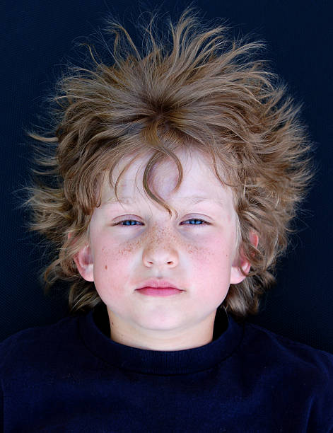 crazy hair boy with crazy hair plasma ball photos stock pictures, royalty-free photos & images