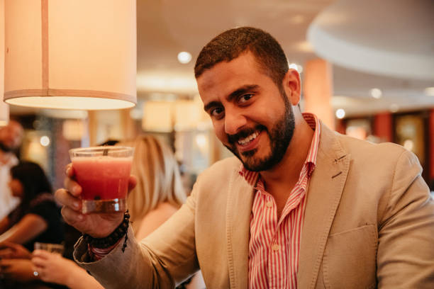 istock Friends having fun drinking mocktails in Dubai 1833064323