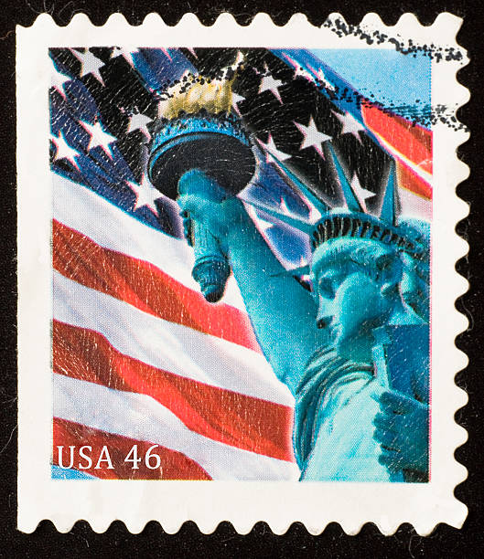 USA 46 cent stamp Stamp from USA with Liberty statue.46 cent stamp valid from June 2011 cent sign photos stock pictures, royalty-free photos & images