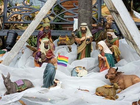 Christmas decorated nativity with figures of beliefs with white background