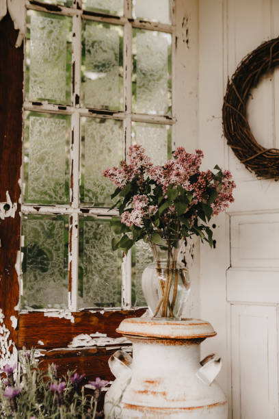 istock Bouquet of Lilacs on Rustic Porch 1833080129
