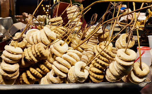 Cookies and donuts, Christmas sweets on the counter of a market stall