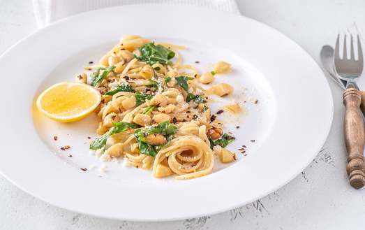 Lemon pasta with almonds, arugula and brown butter