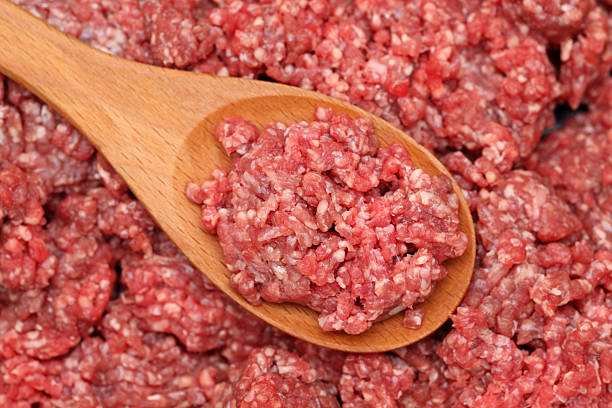 istock Minced meat in a wooden spoon 183311831