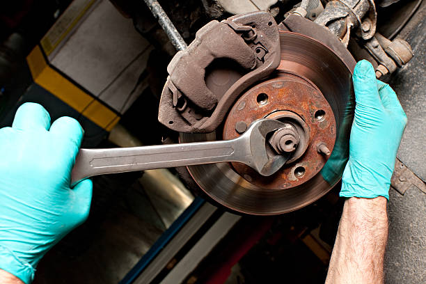 istock Man repairing a brakes 183312110