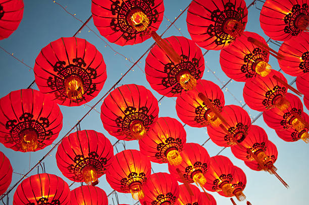 Red Asian Lanterns Asian lanterns during a religious festival.  lantern photos stock pictures, royalty-free photos & images