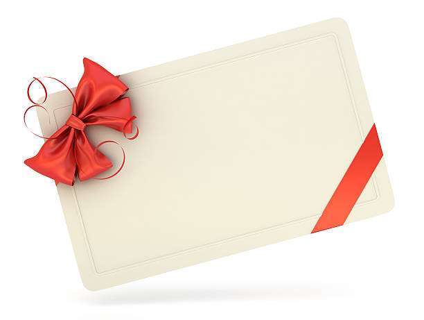 Single white blank gift card with a red ribbon and bow stock photo