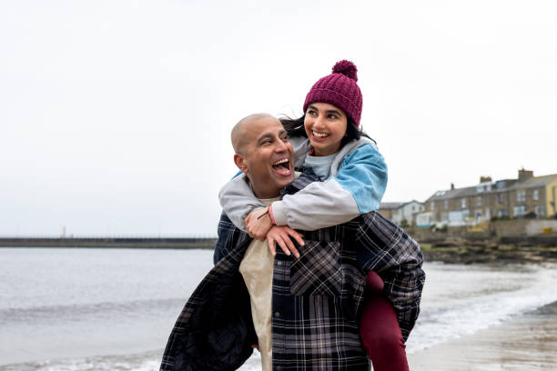 istock Sharing Laughter on a Piggyback Ride 1833131196