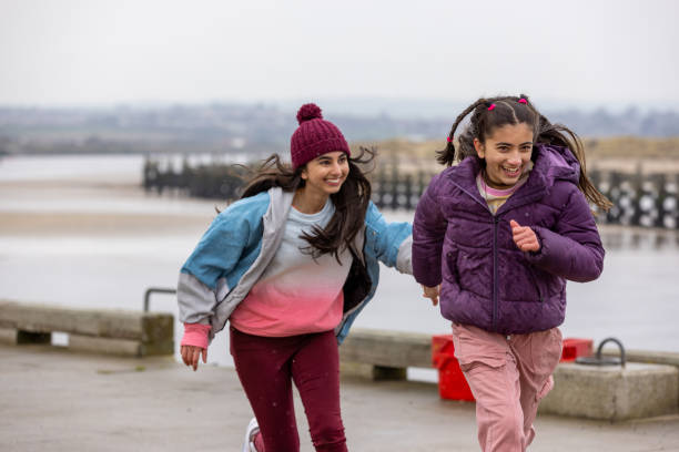 istock Sisters Enjoying a Holiday Getaway 1833137437