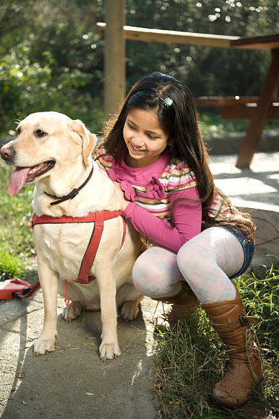 istock Little Girl and Dog 183313775