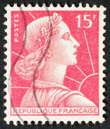 French postage stamp isolated on black