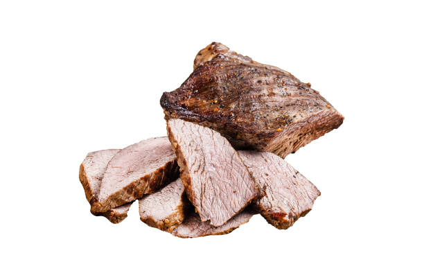 istock Roast Tri Tip or sirloin bottom beef steak on a plate with arugula.  Isolated, white background. 1833142249